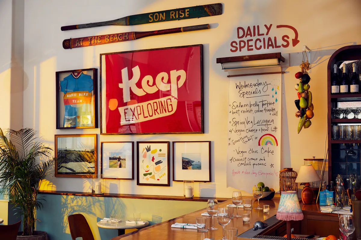 a wall with decorations and a menu on it