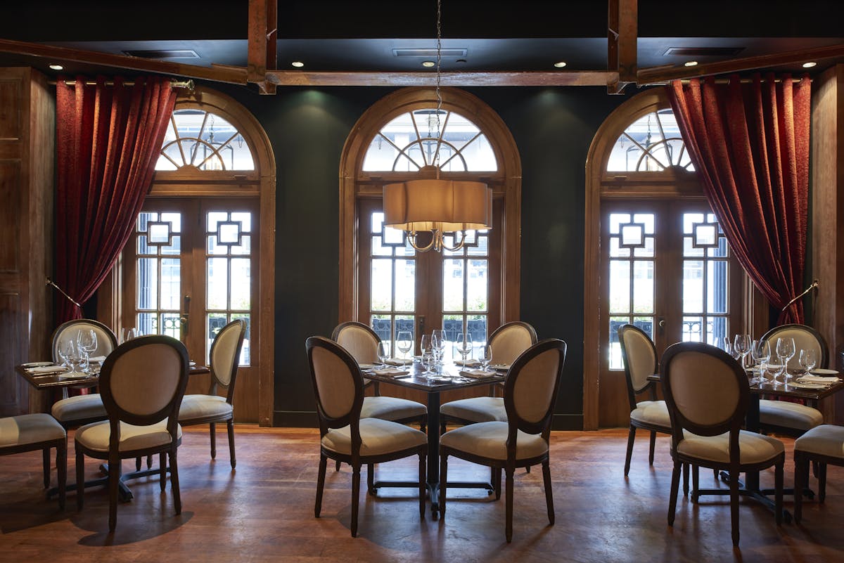 a large room filled with dining tables