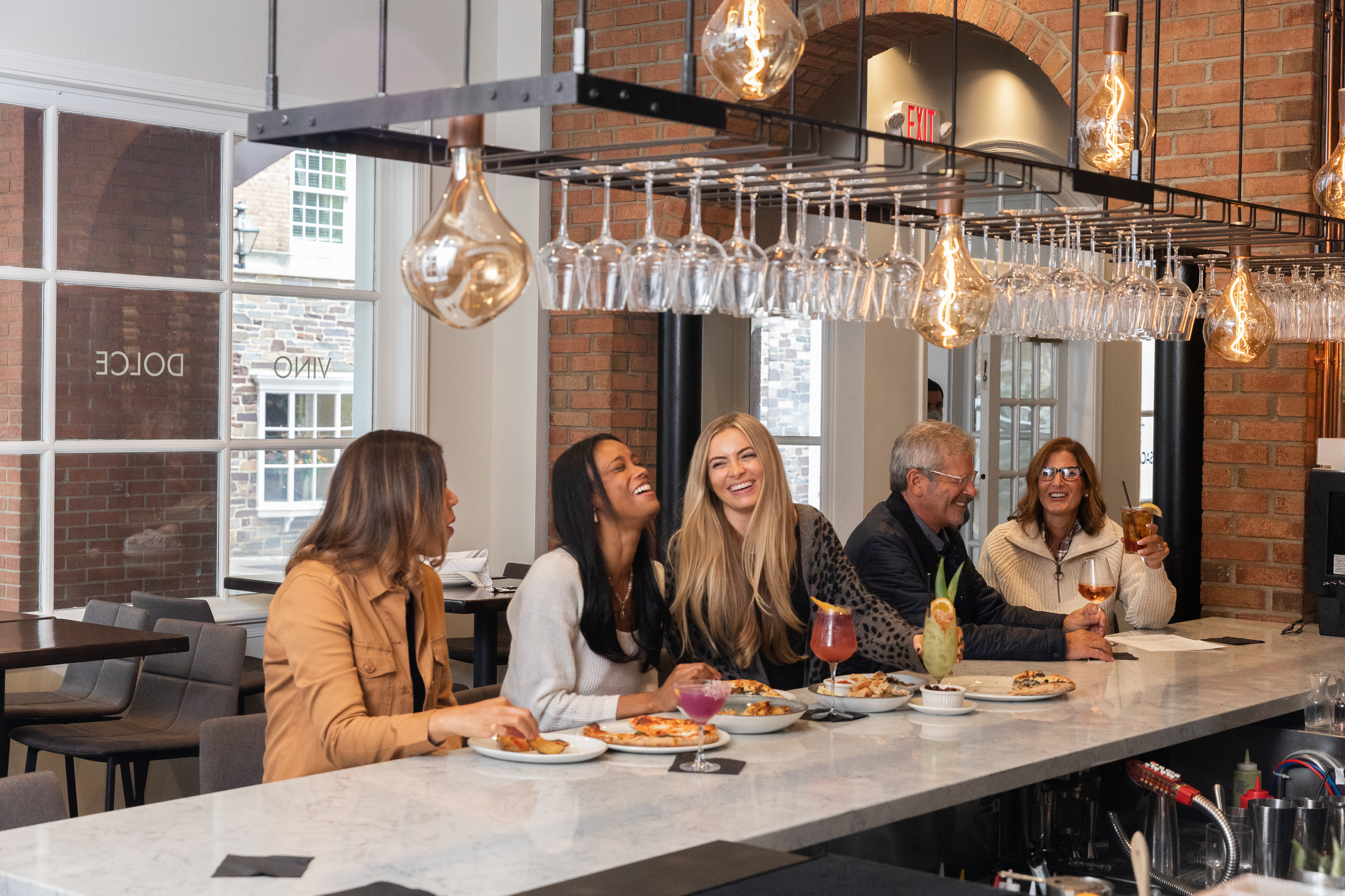 a group of people sitting at a table