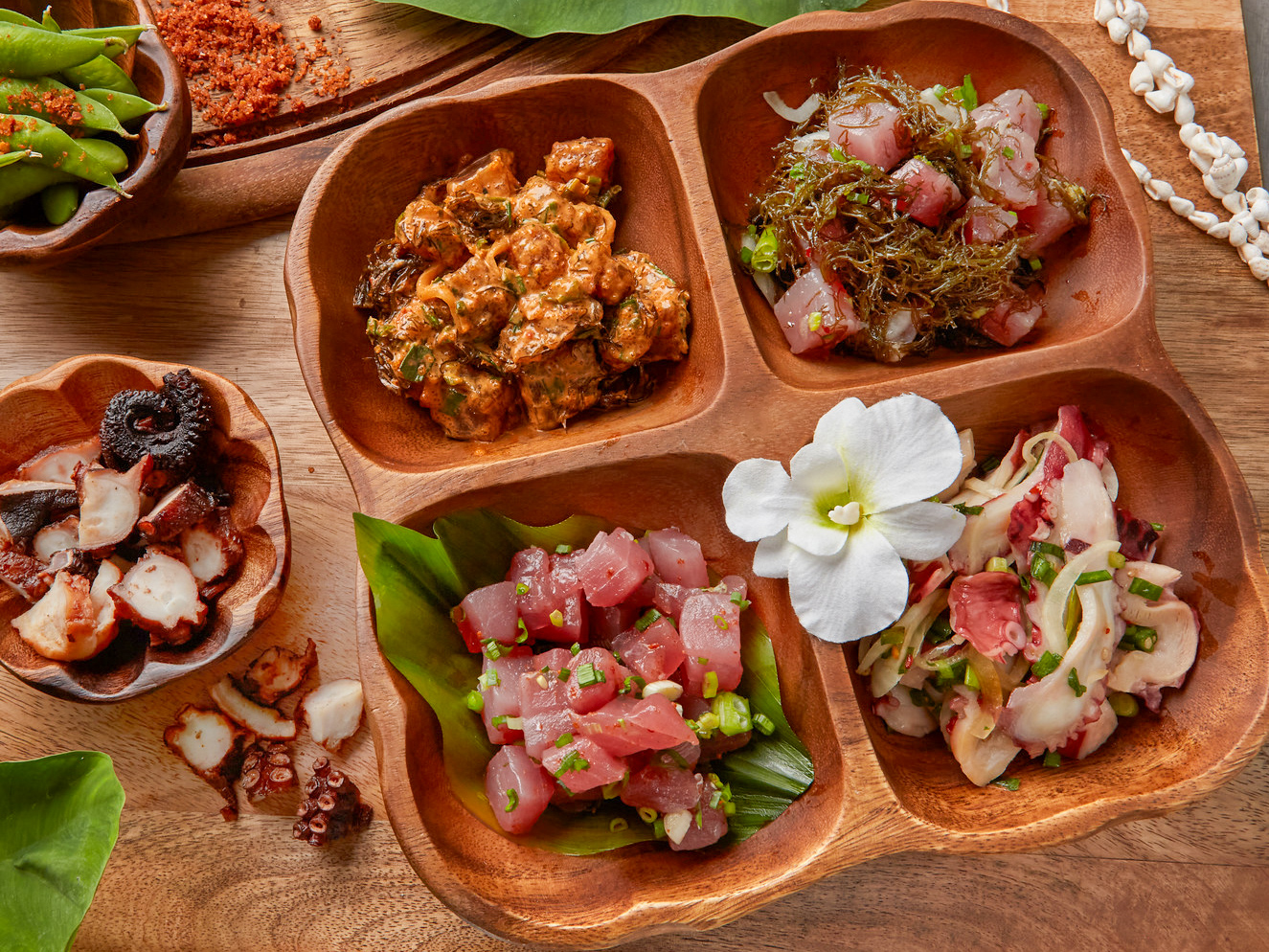 a bunch of food sitting on top of a wooden table