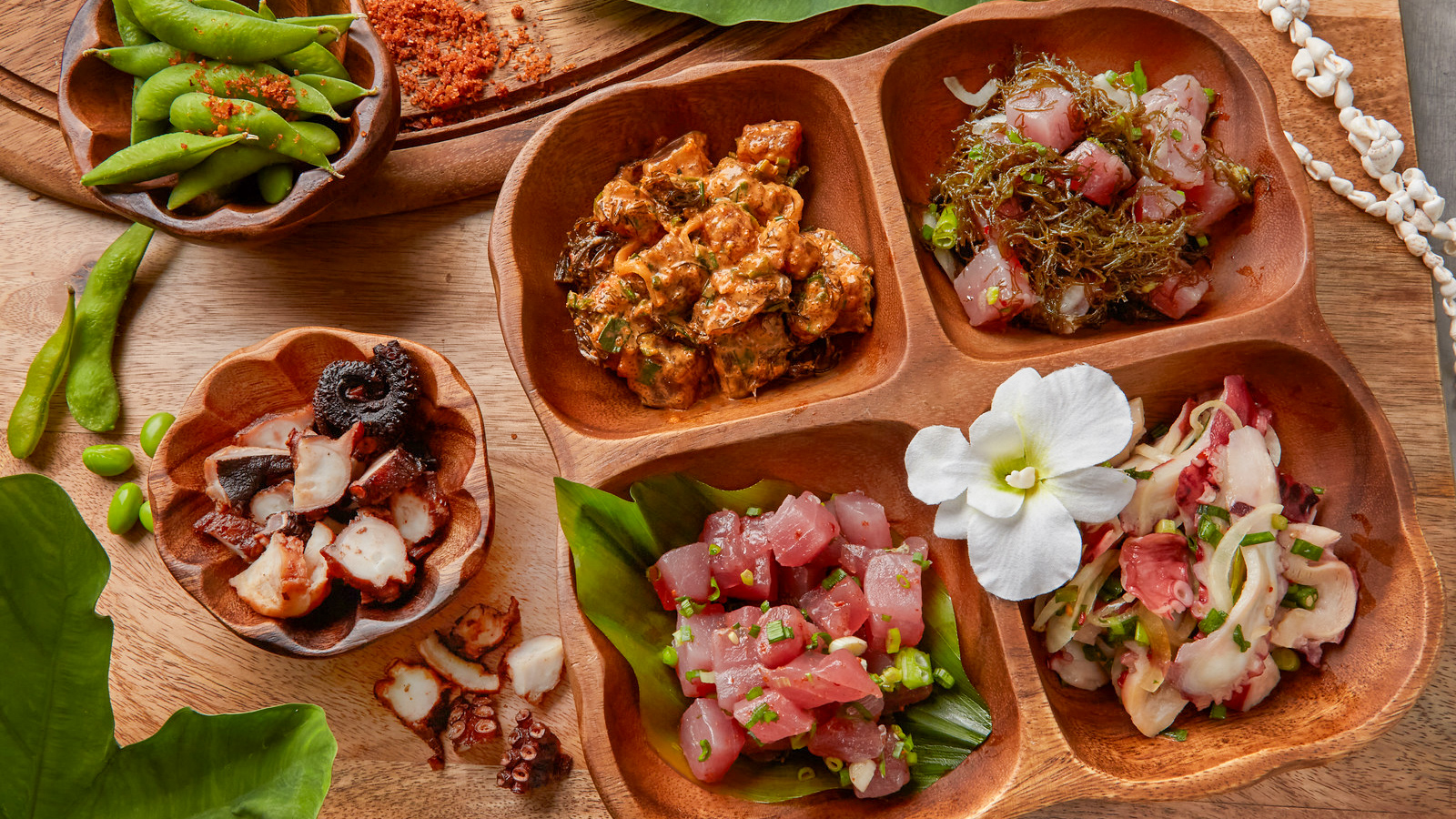 a bunch of food sitting on top of a wooden table