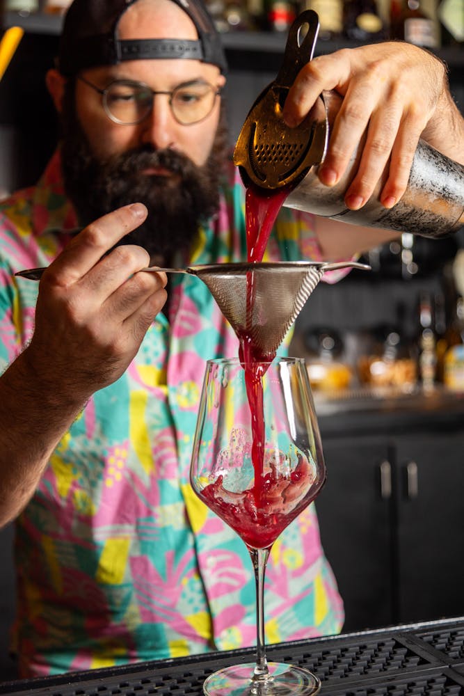 a man holding a glass of wine