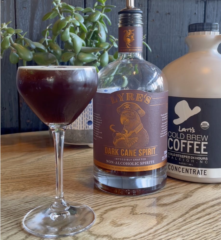 a bottle and a glass of wine