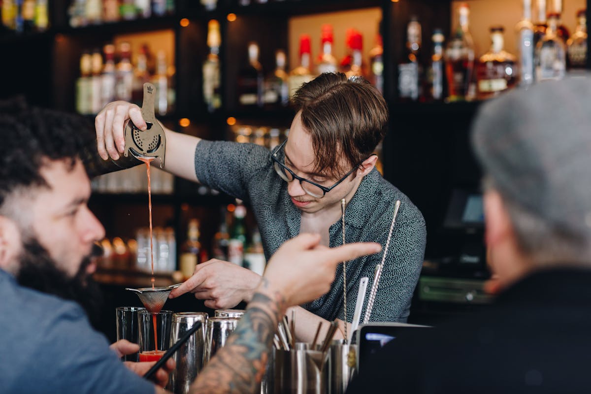 a man holding a wine glass