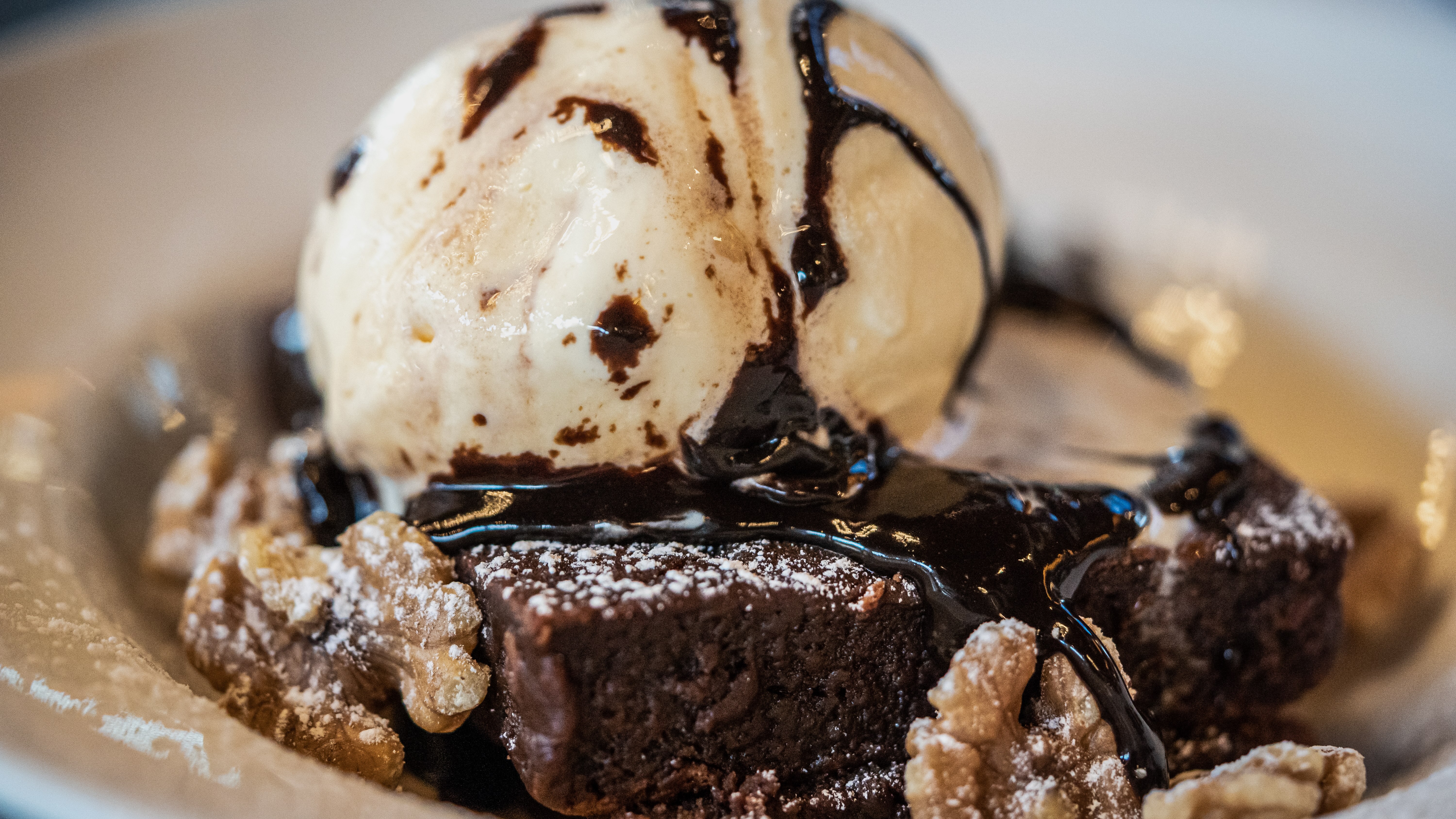 a piece of cake and ice cream on a plate