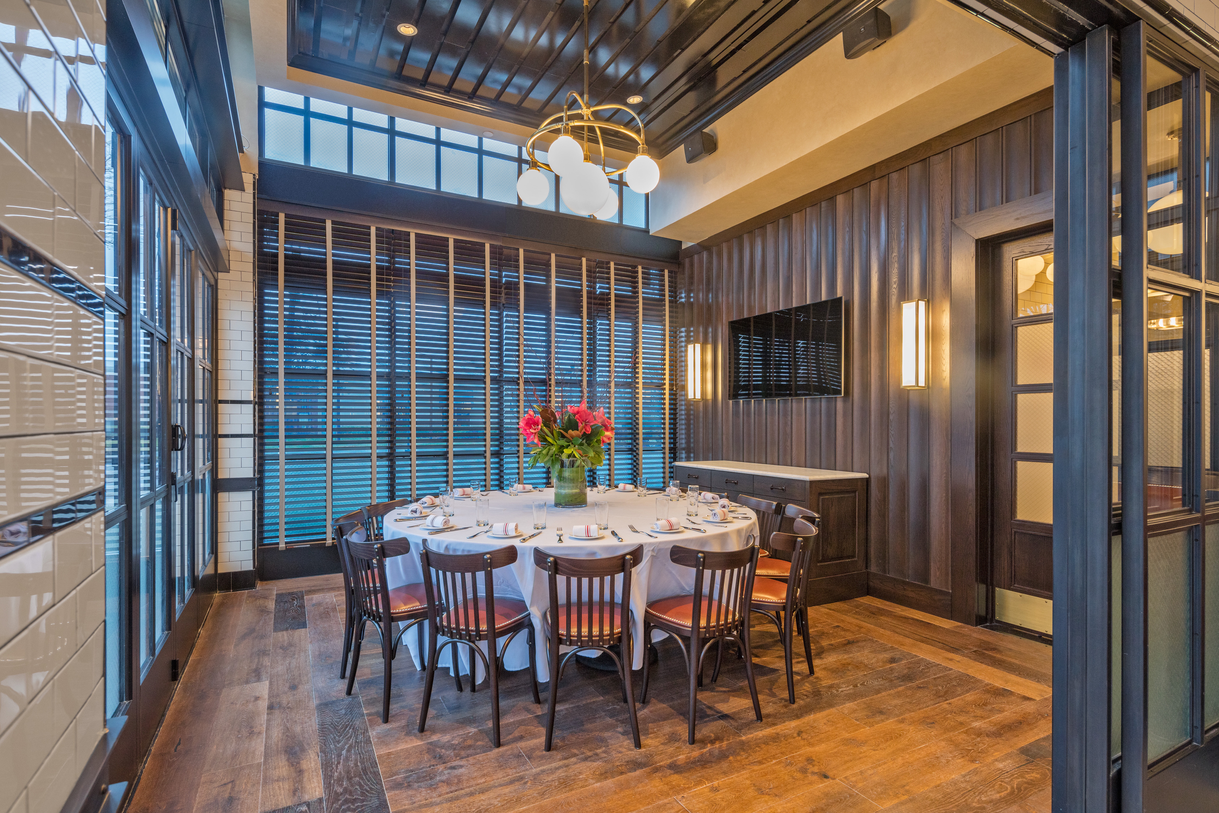 a dining room table in front of a building