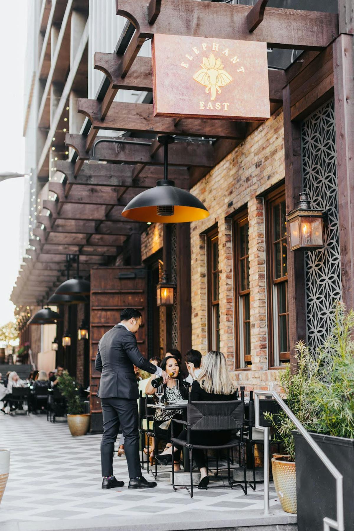 a statue of a man and a woman walking down a street