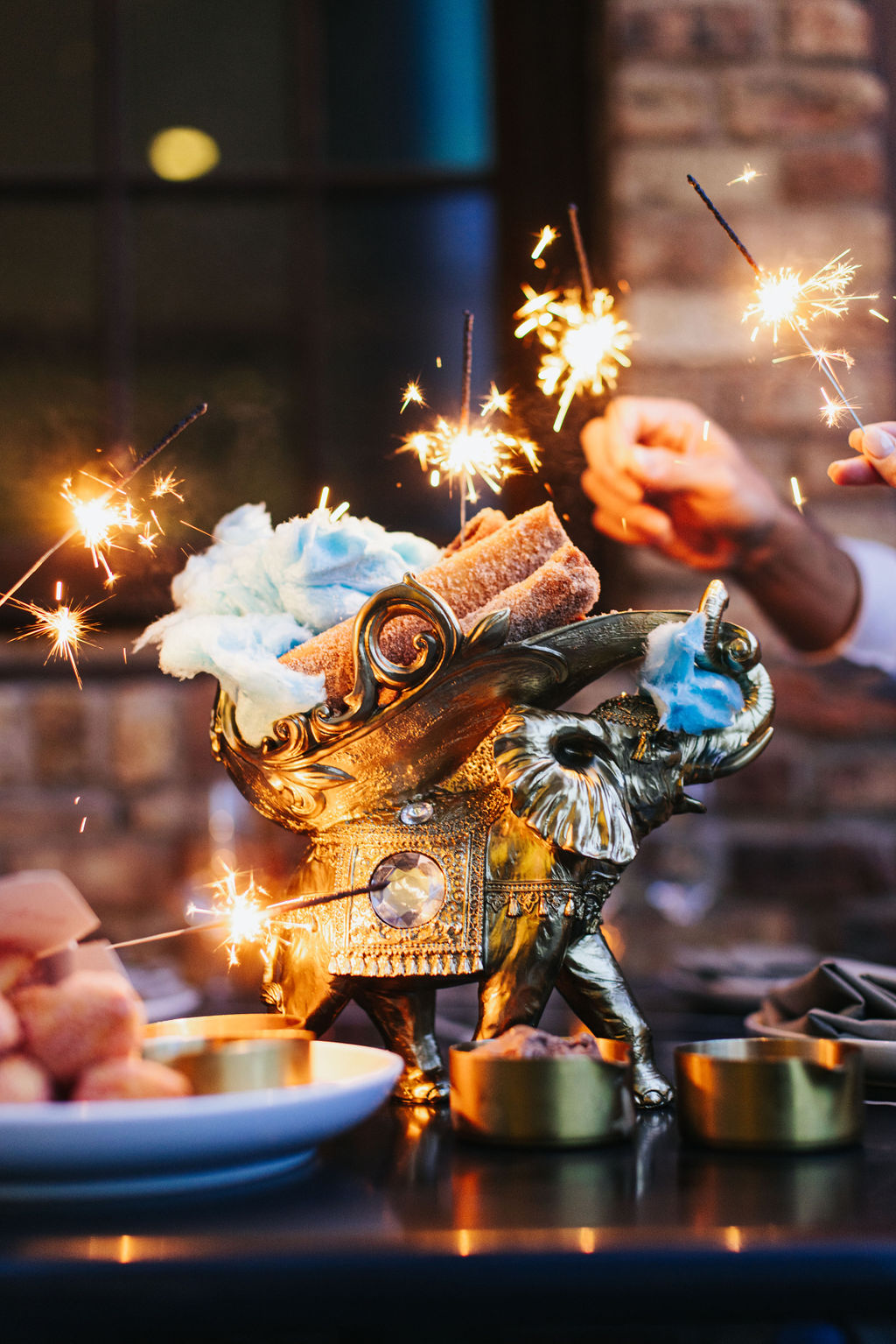 a cake with lit candles