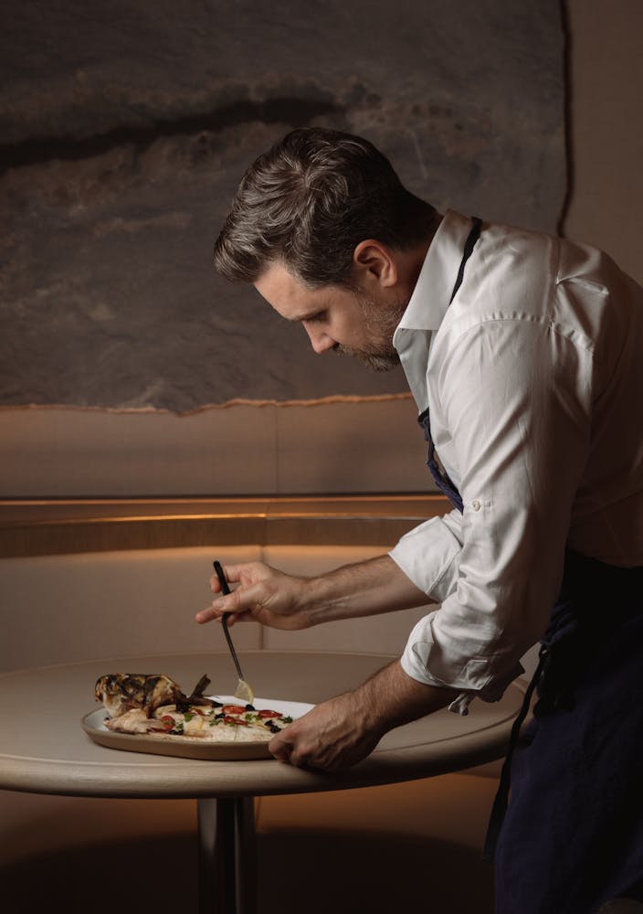 a man holding a plate of food