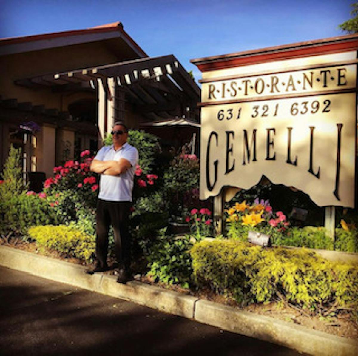 a person standing in front of a sign