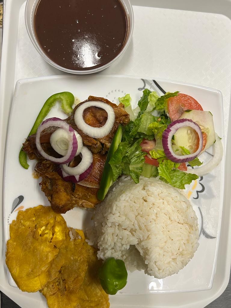 a plate of food with rice and vegetables
