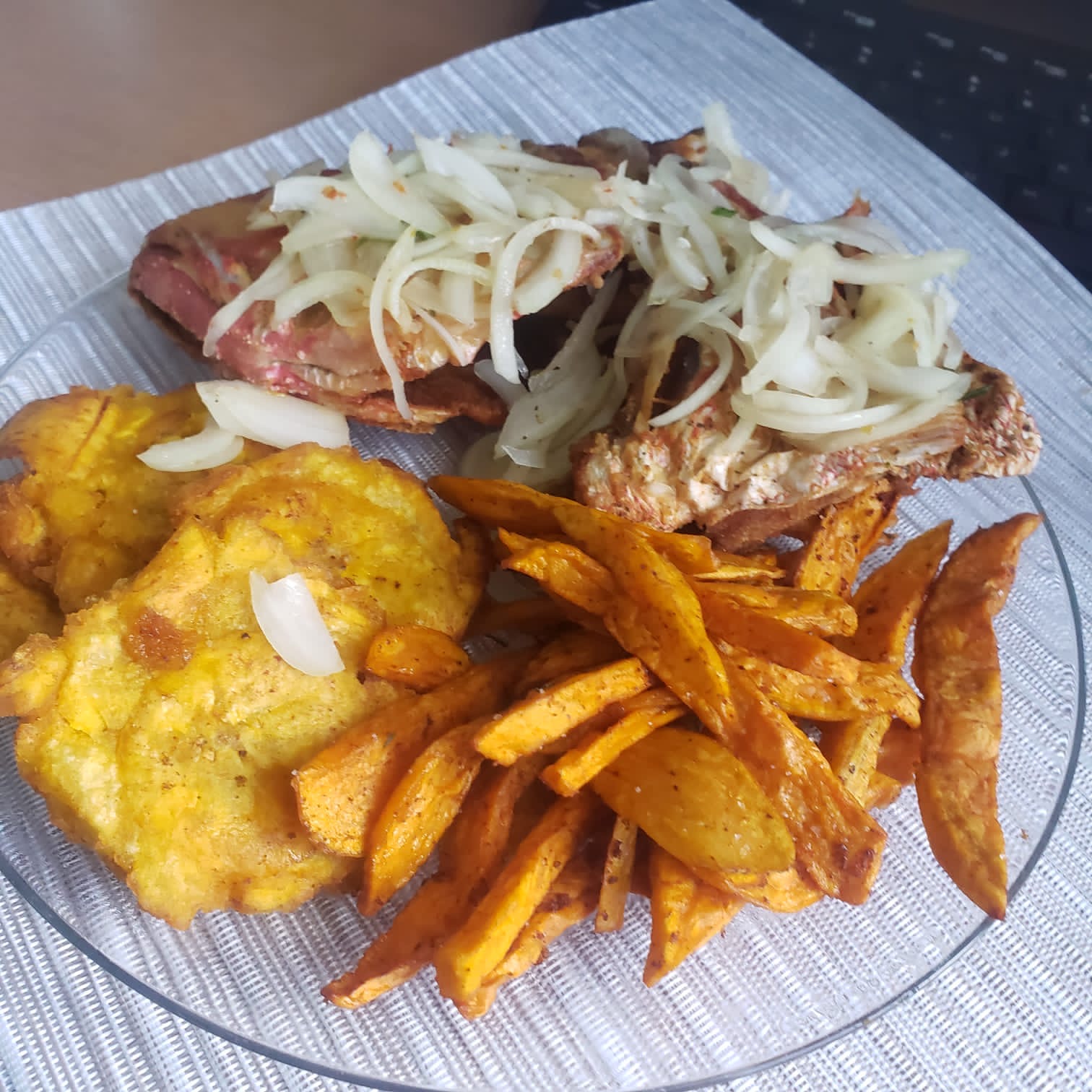 a hot dog and fries on a plate