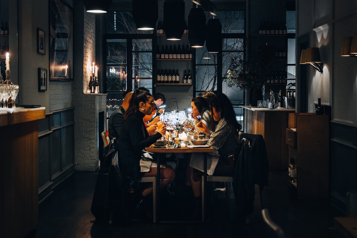 a group of people in a kitchen