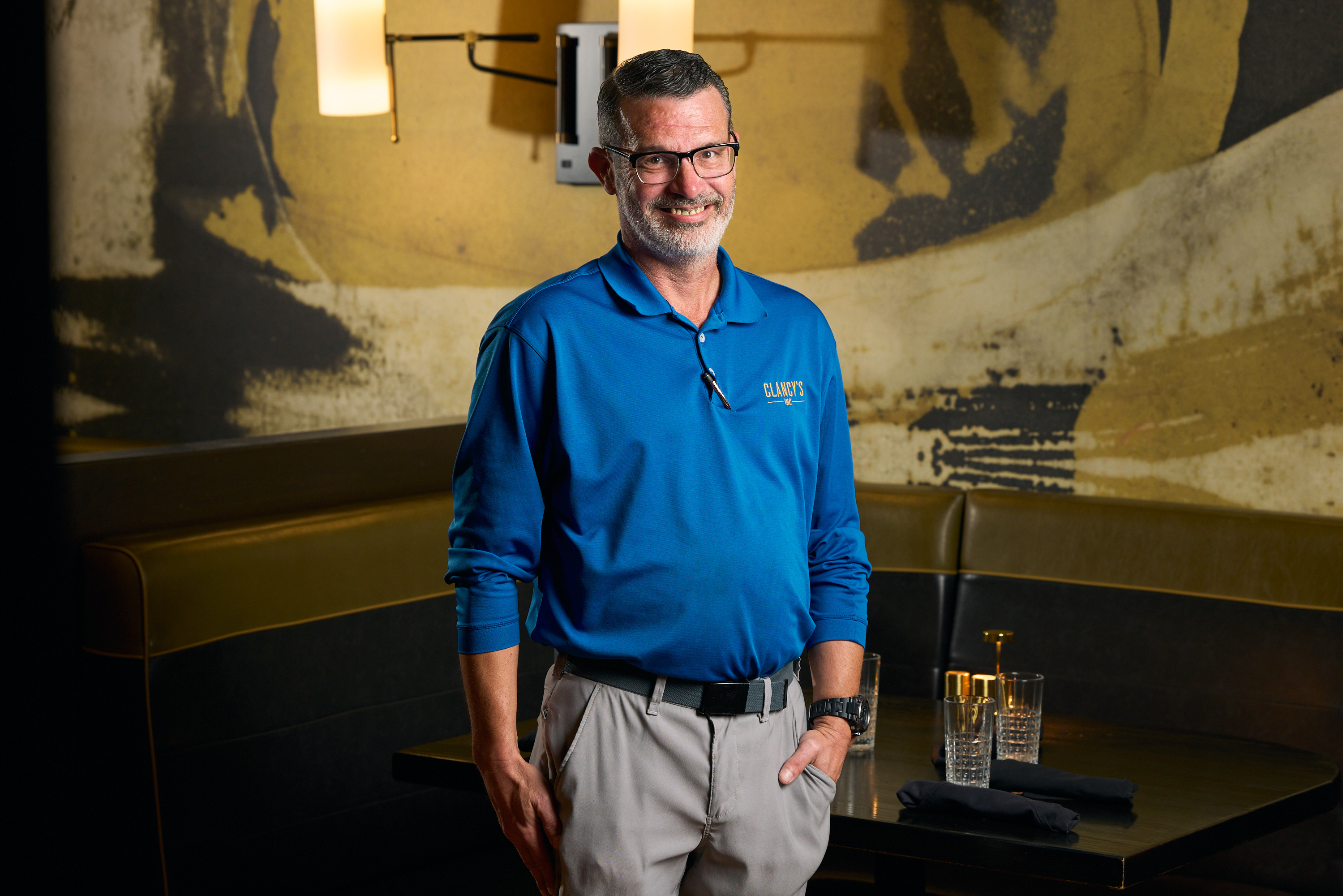 a person standing posing for the camera
