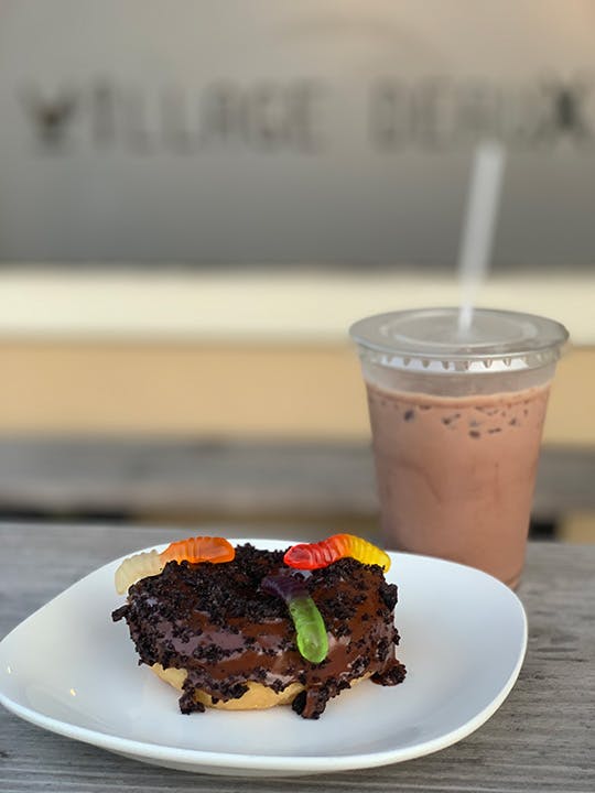 a close up of a plate of food and a cup of coffee