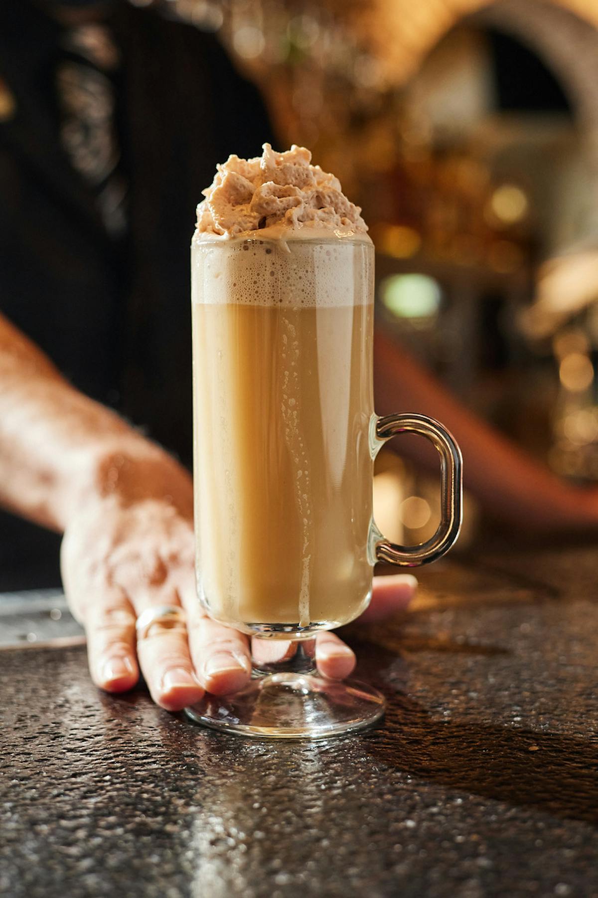 a bartender serving a drink