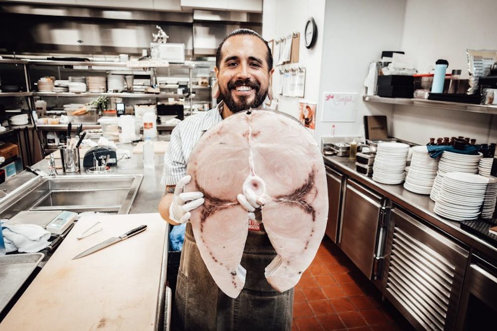 a man standing in a kitchen