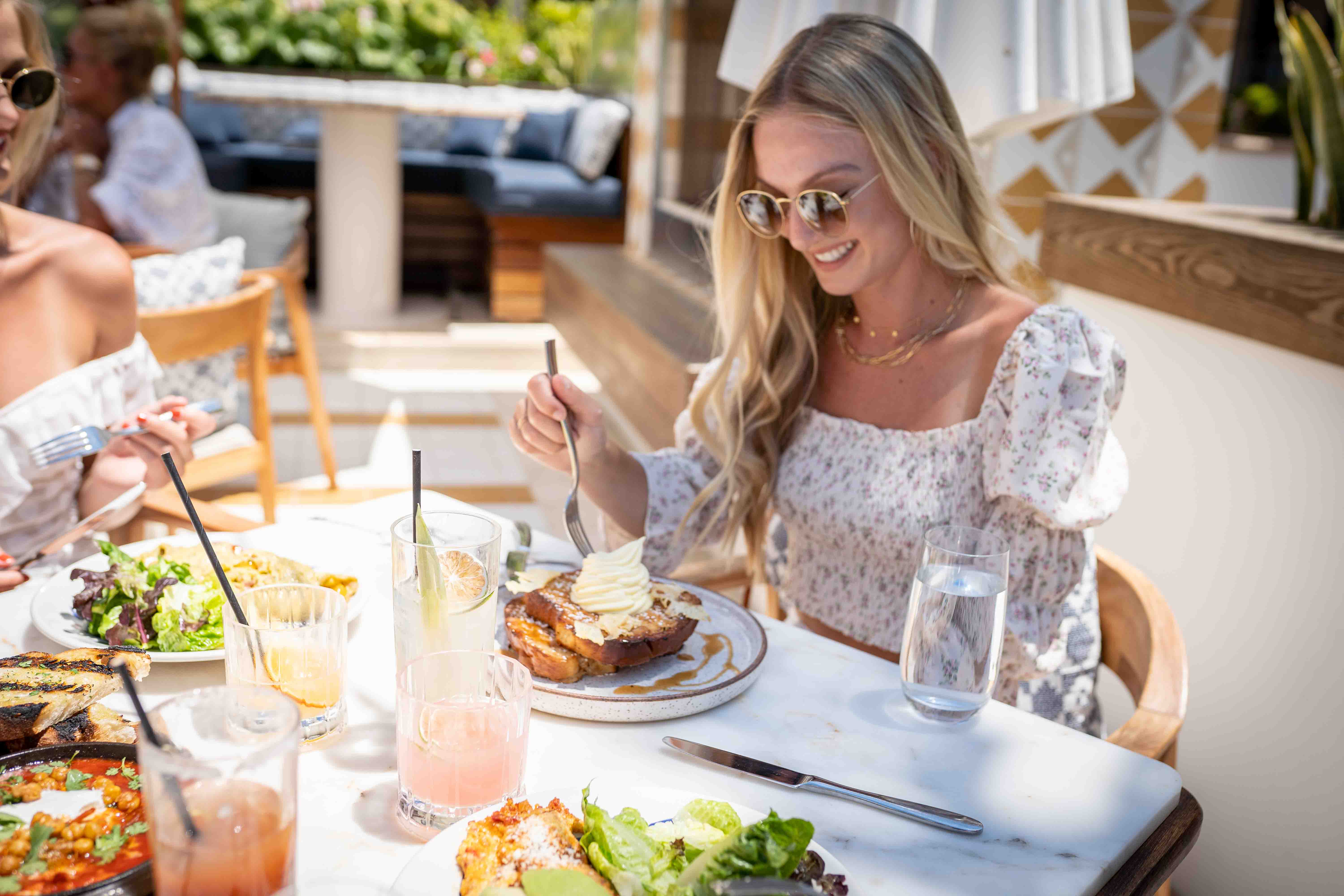 Serea coastal cuisine restaurant in Coronado with oceanfront dining, Mediterranean seafood dishes, and brunch spread at Hotel del Coronado.