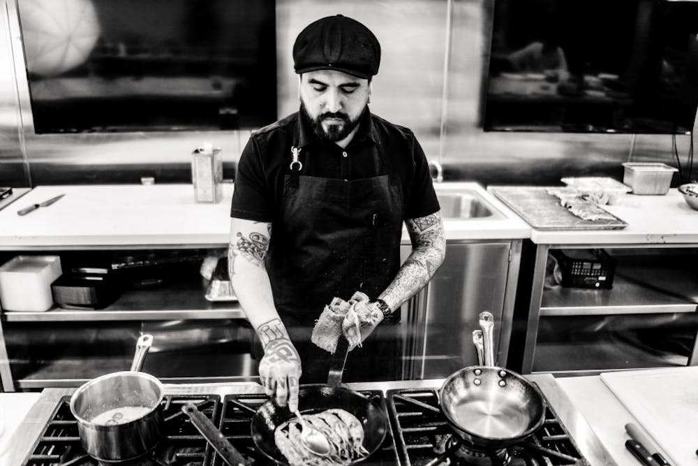 a person cooking in a kitchen