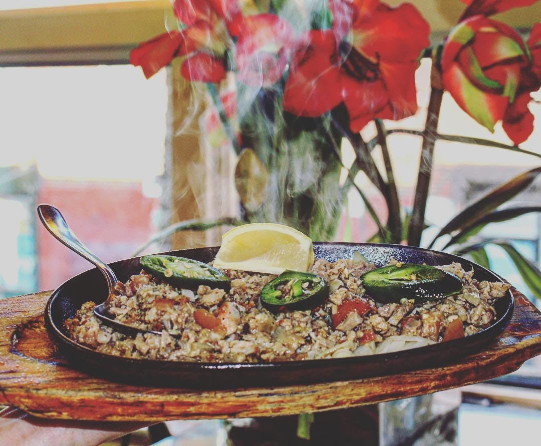 food on a sizzling plate