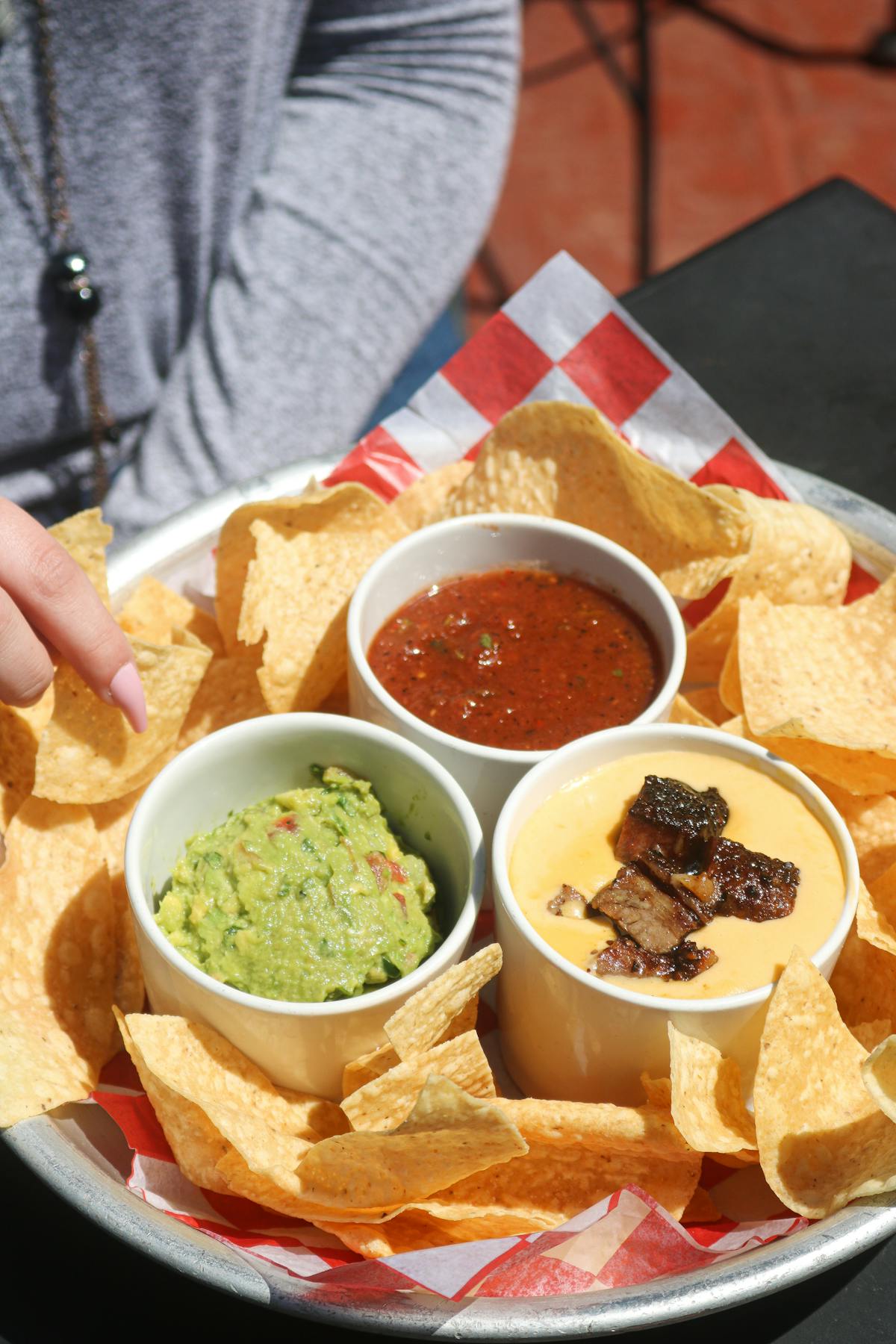 a bowl of food on a plate on a table