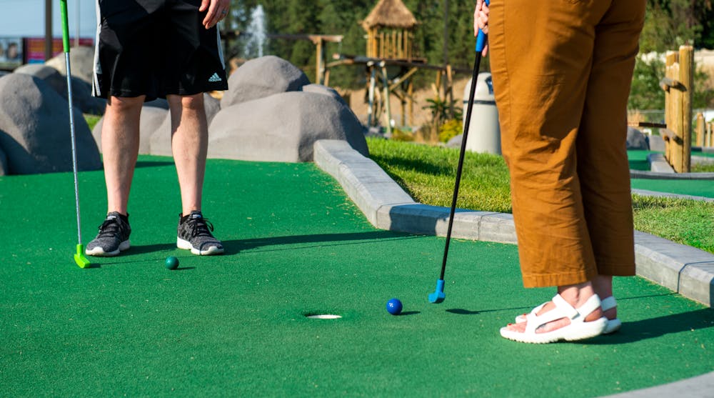 a person playing golf