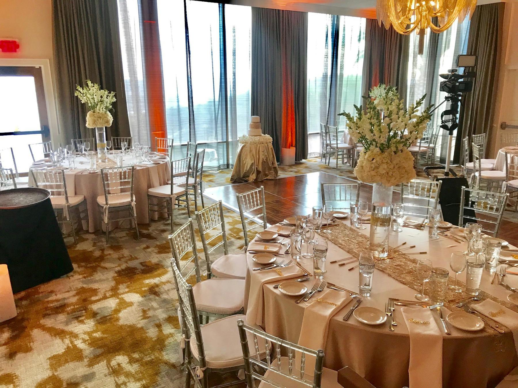 a dining room table in front of a window