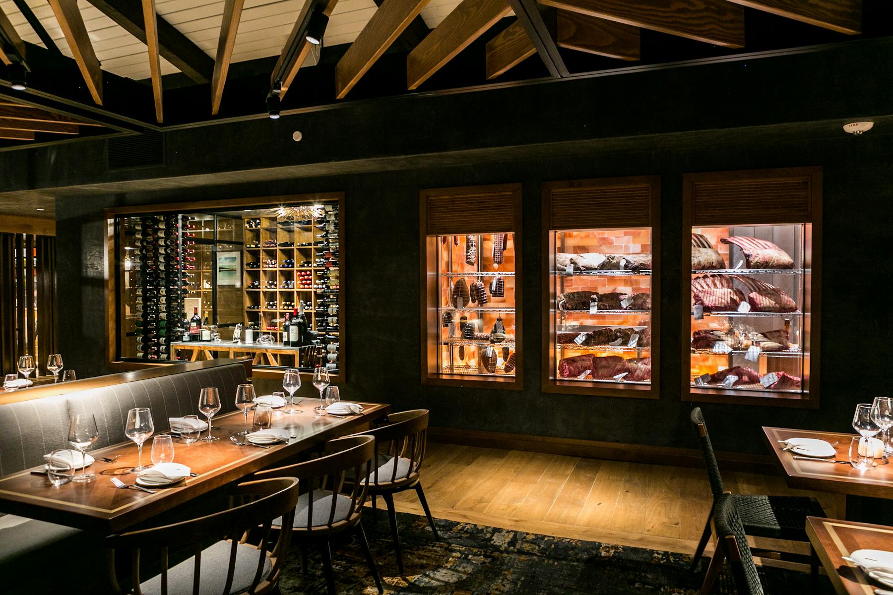 a kitchen with a table in a restaurant