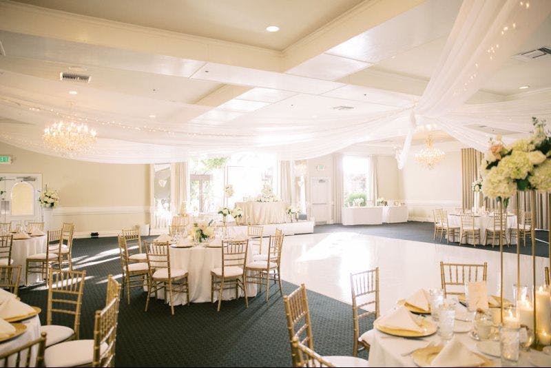 a room filled with furniture and a large window