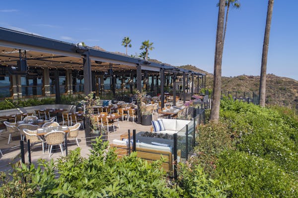 outdoor dining at castaway burbank with views of los Angeles