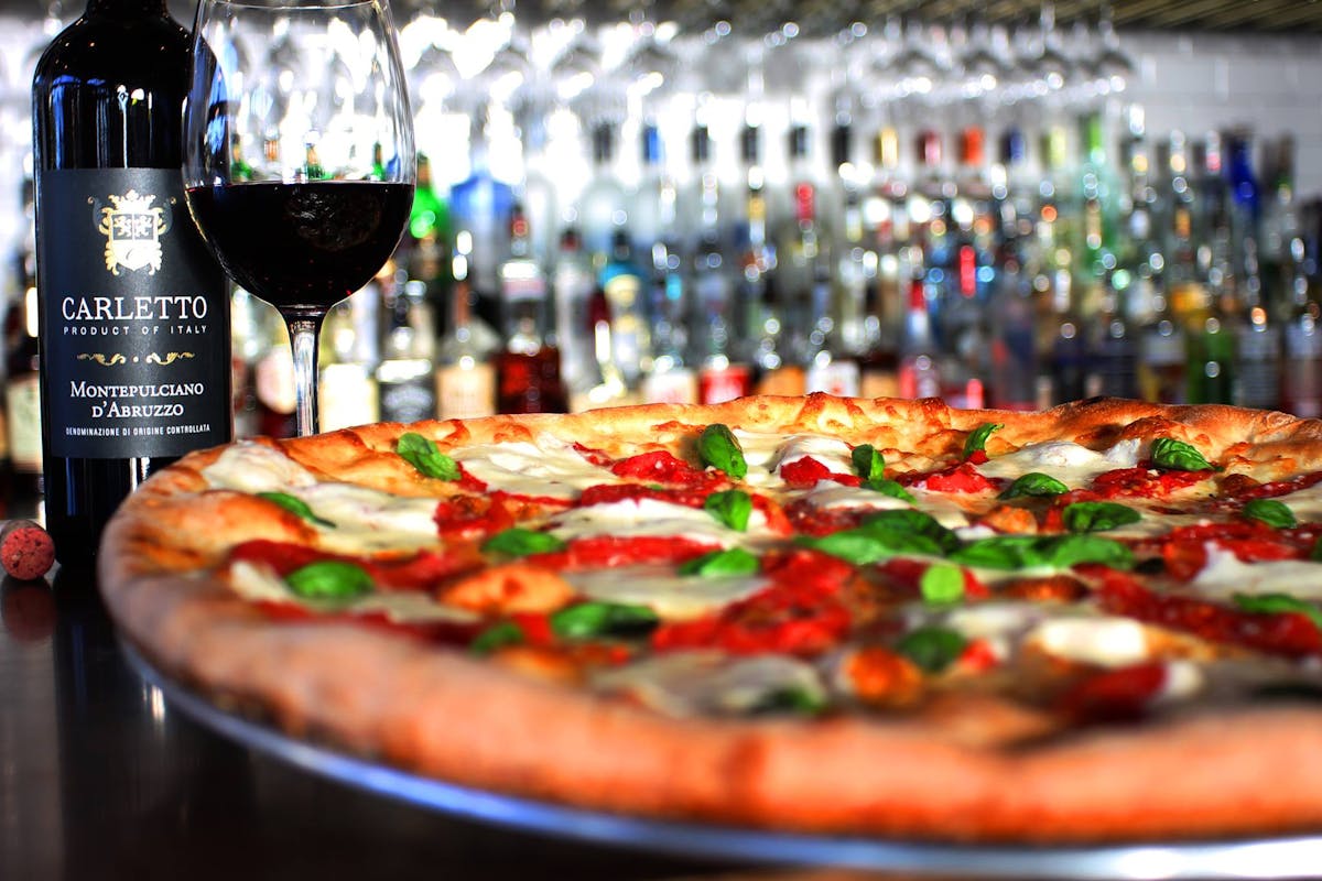 a pizza sitting on top of a table