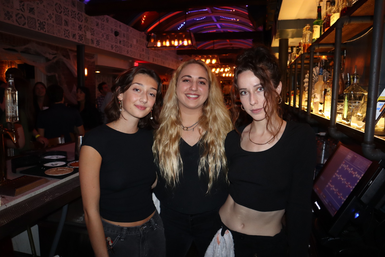 a person standing in front of a restaurant