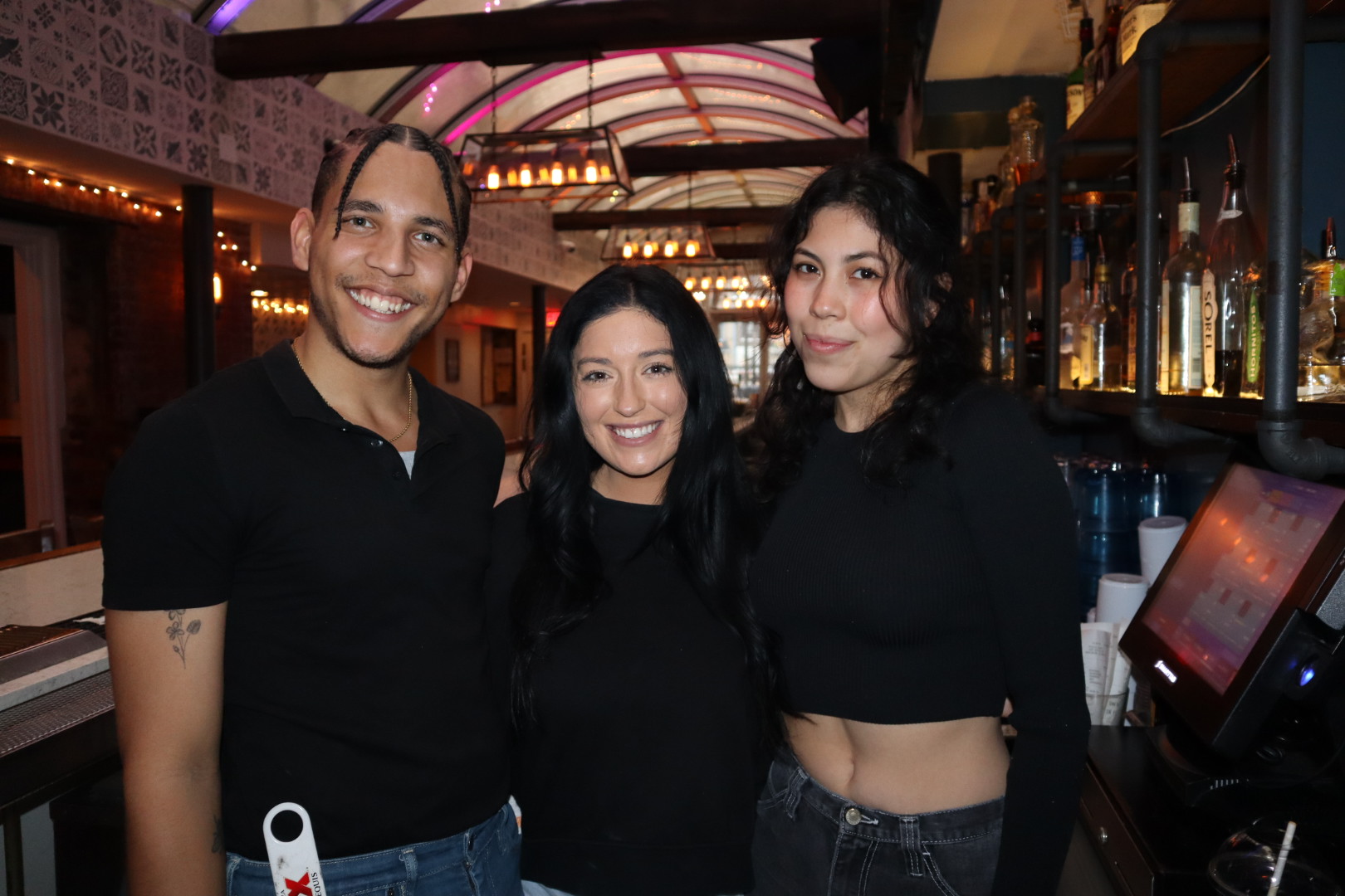 a couple of people that are standing in front of a building