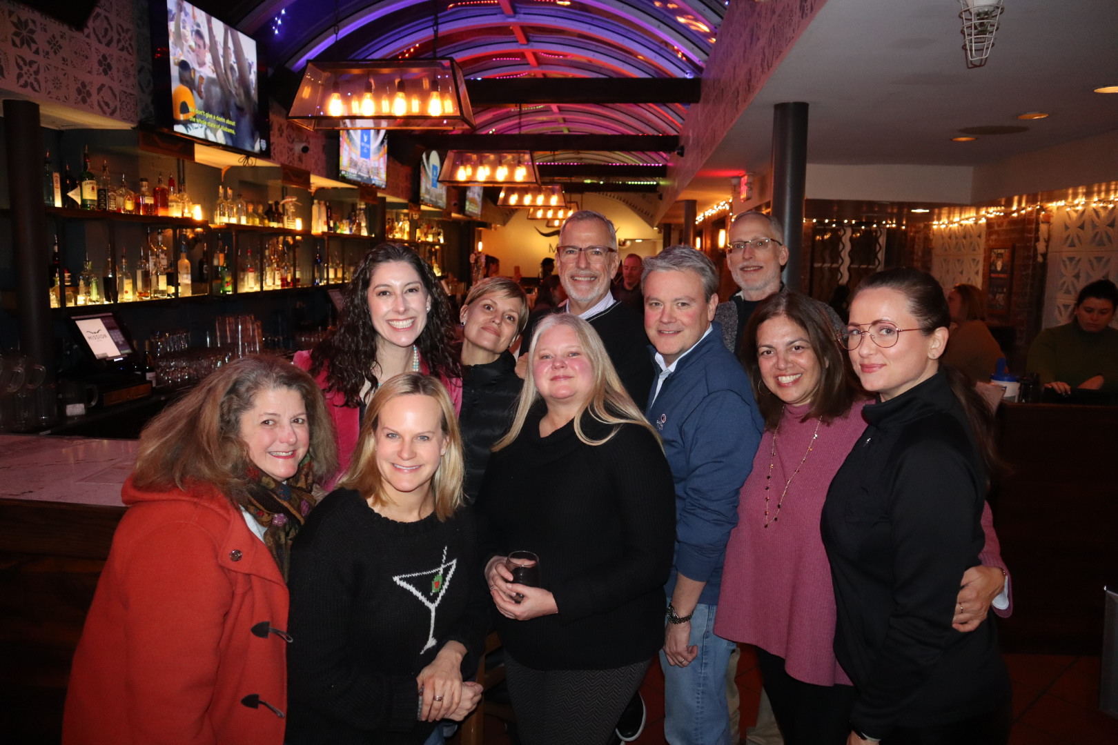 a group of people posing for the camera