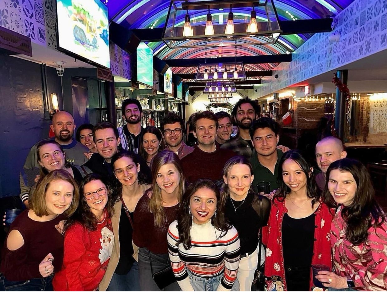 a group of people posing for a photo