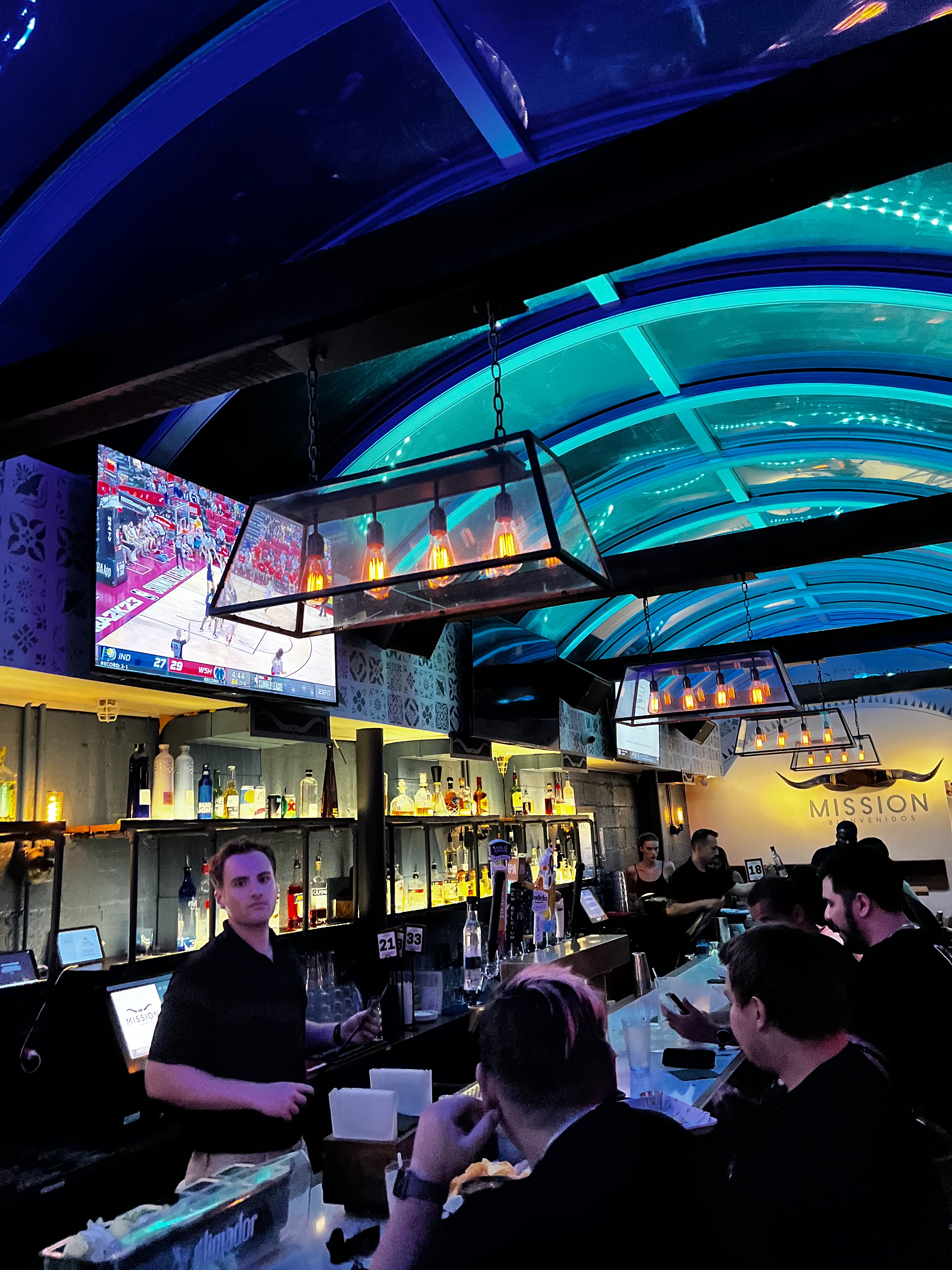 a group of people sitting at a train station