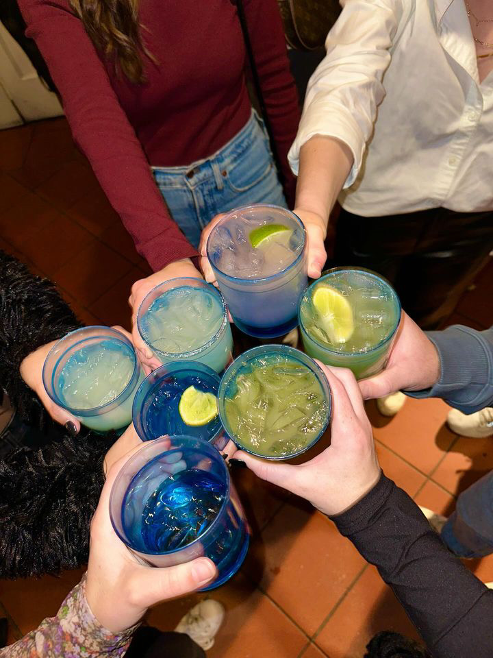 a person holding a plate of food