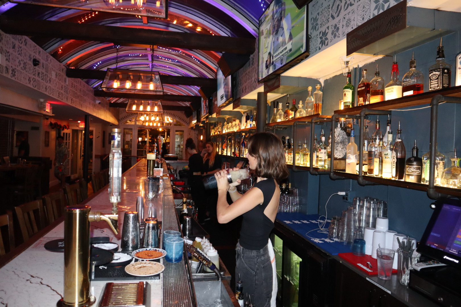 a person holding a glass of wine