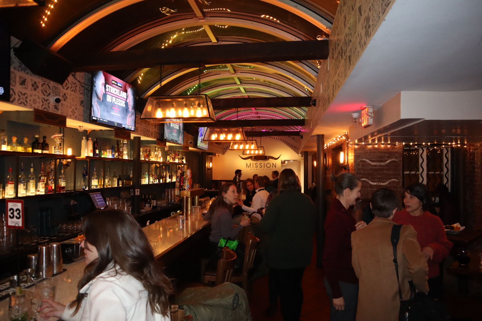 a group of people standing in front of a crowd