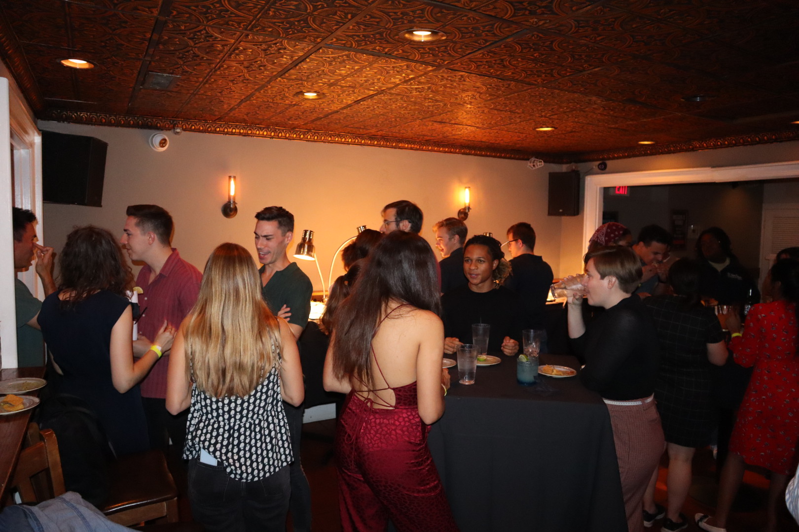 a group of people standing in a room