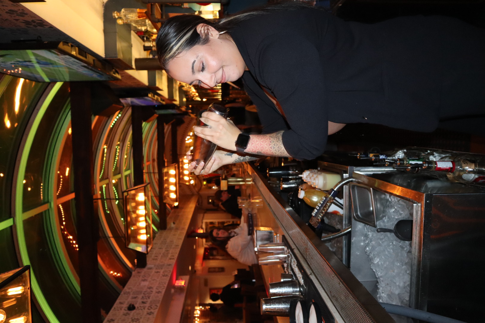 a person that is standing in the kitchen