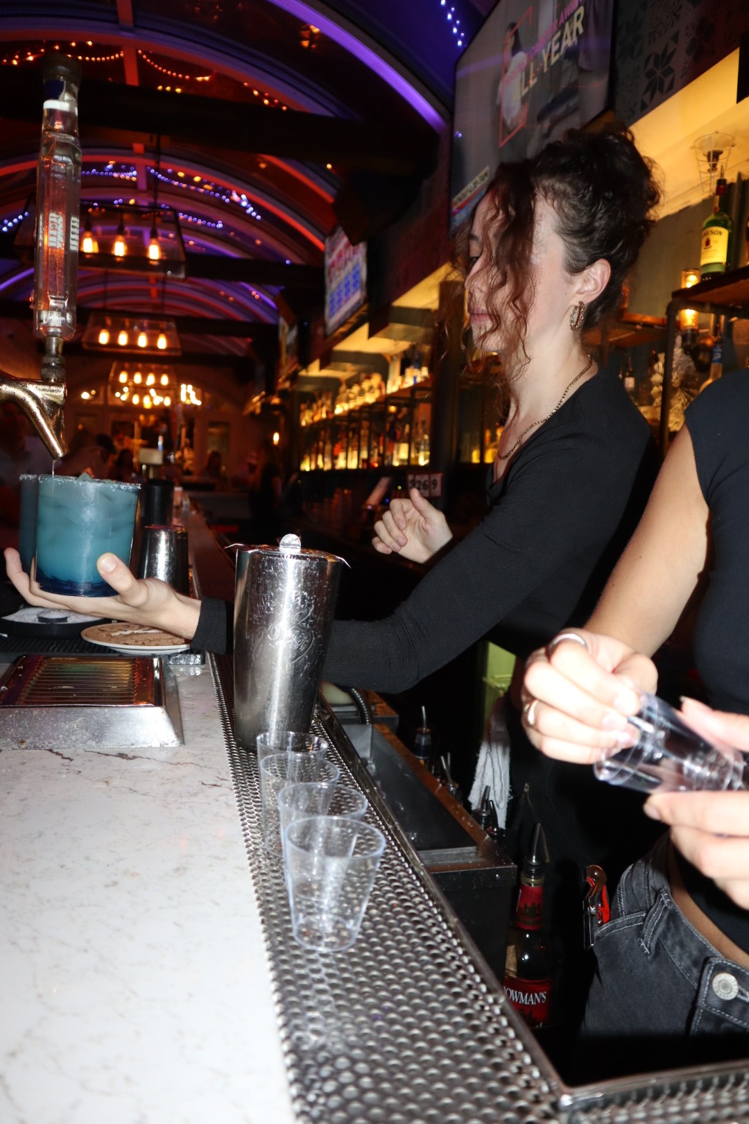 a person holding a glass of wine