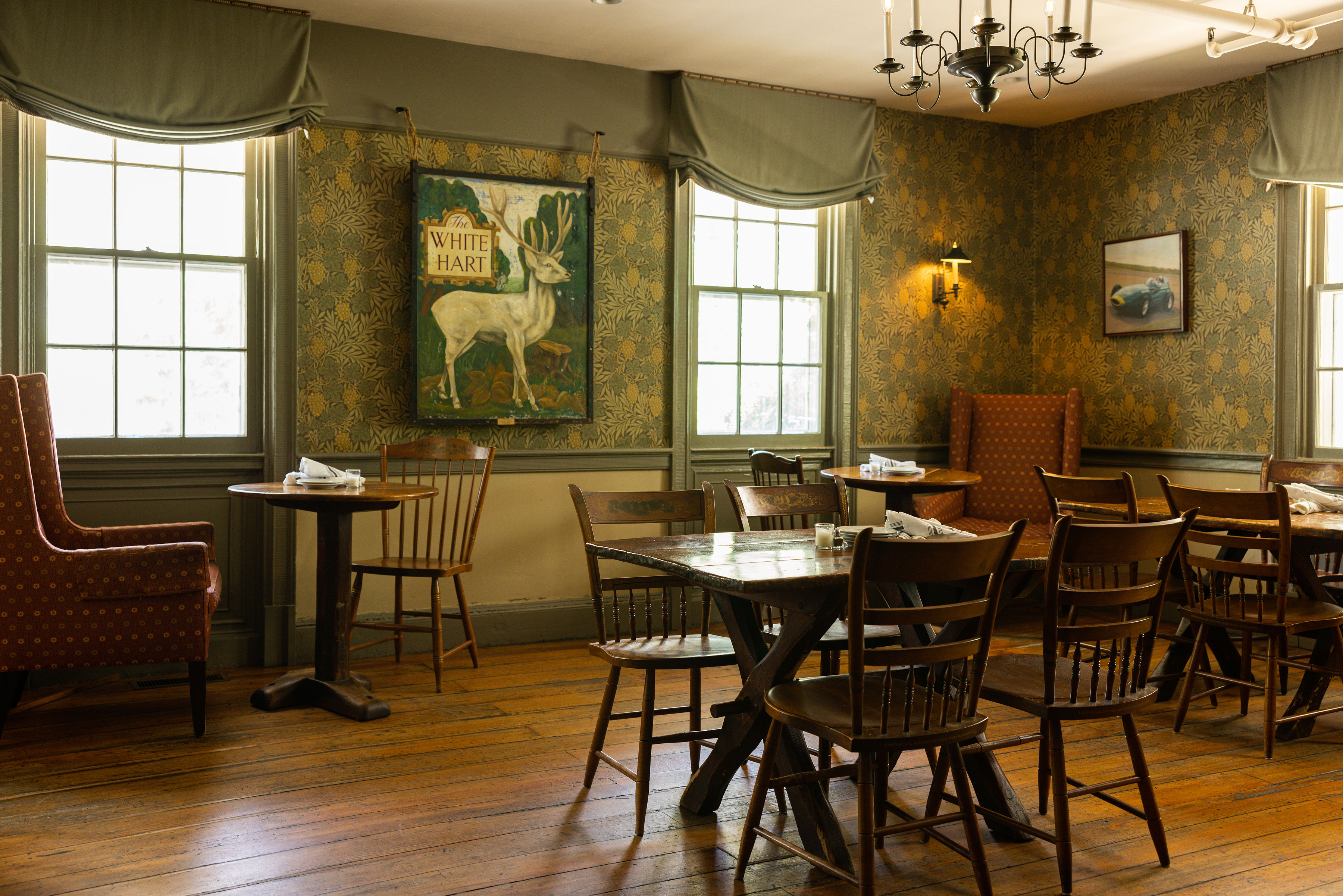 a dining room table in front of a window