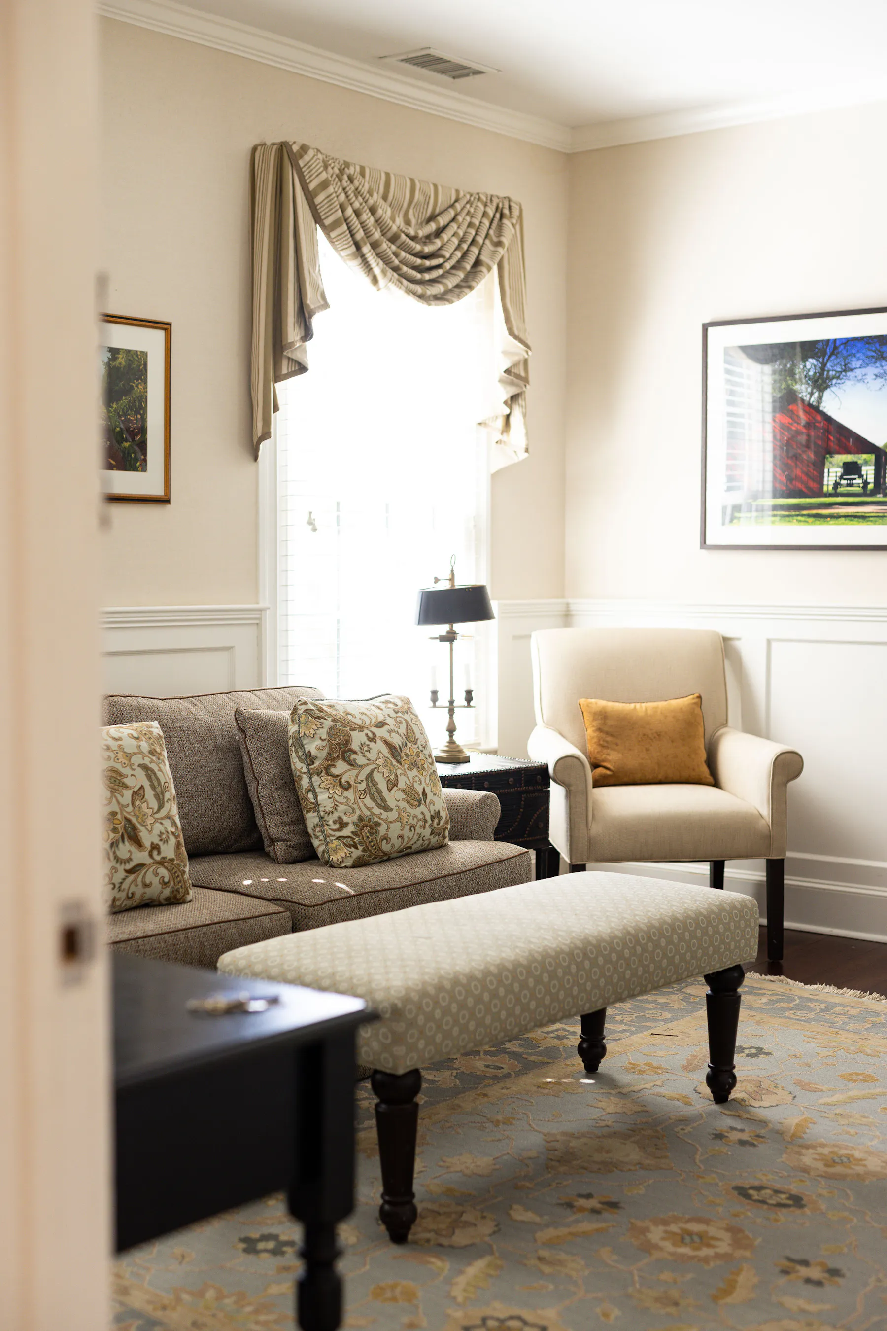 a living room filled with furniture and a flat screen tv