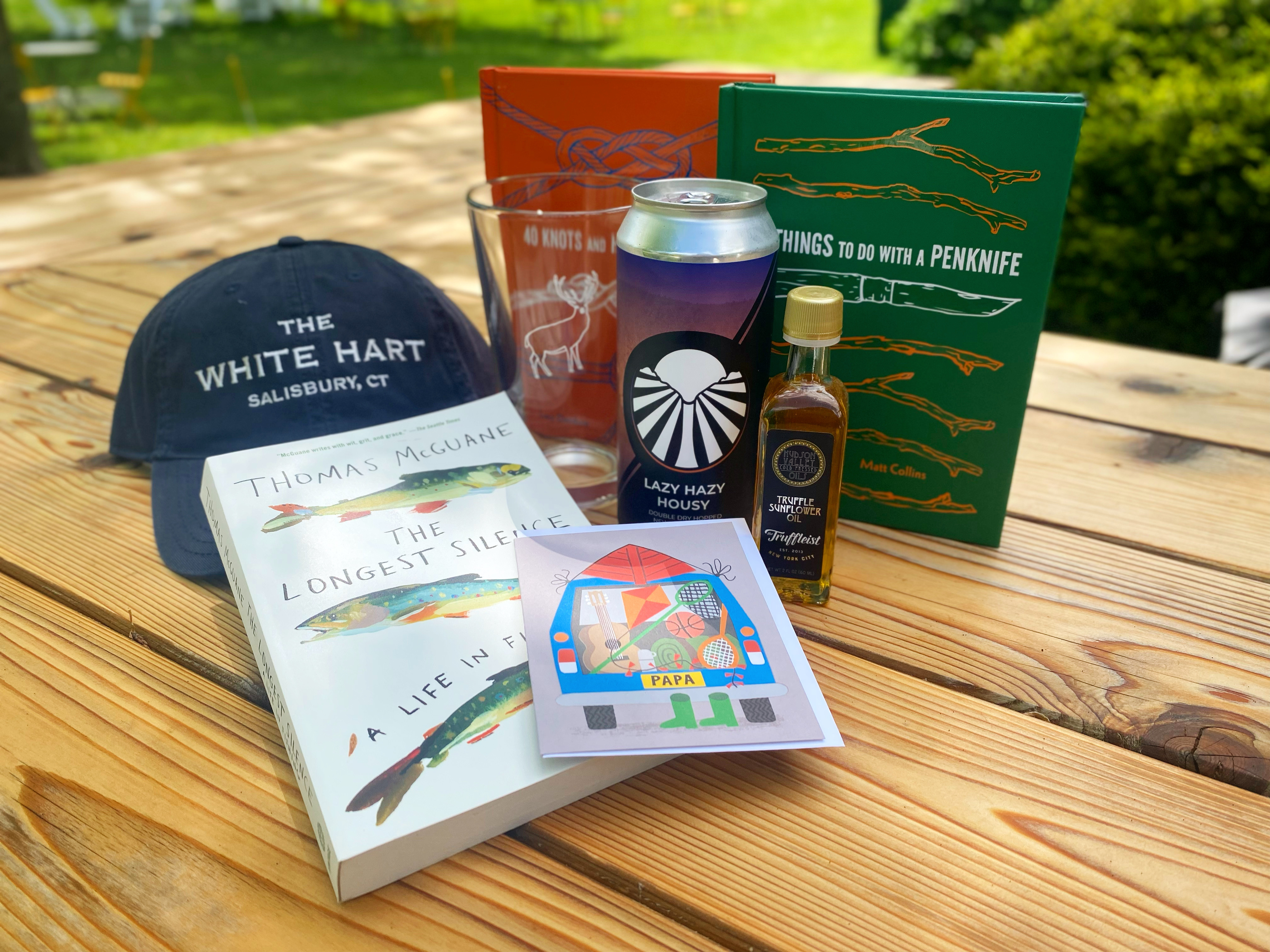 a book sitting on top of a picnic table