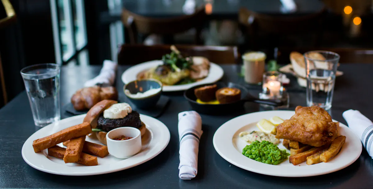 a plate of food and a cup of coffee on a table