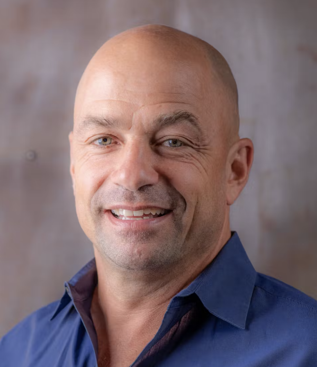 a man smiling for the camera