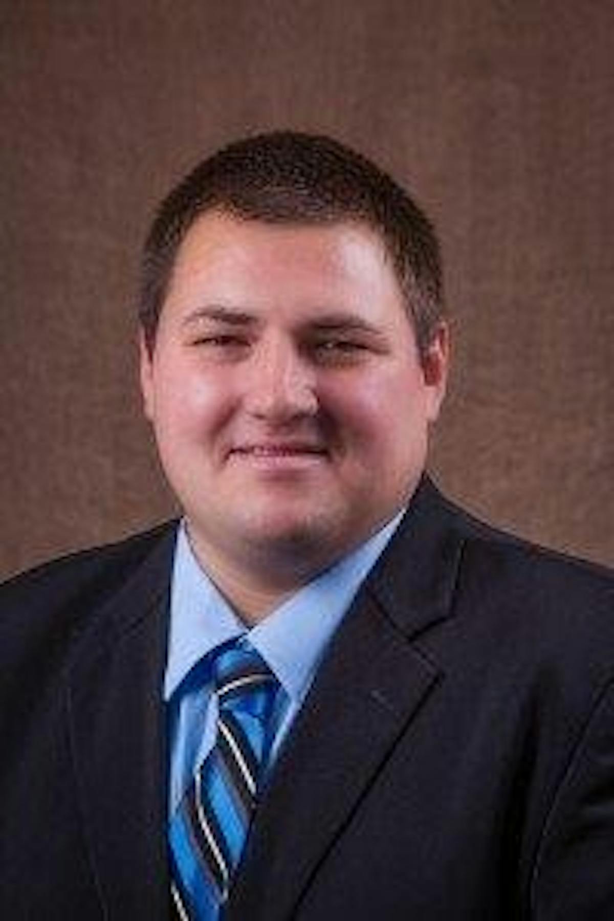 a man wearing a suit and tie