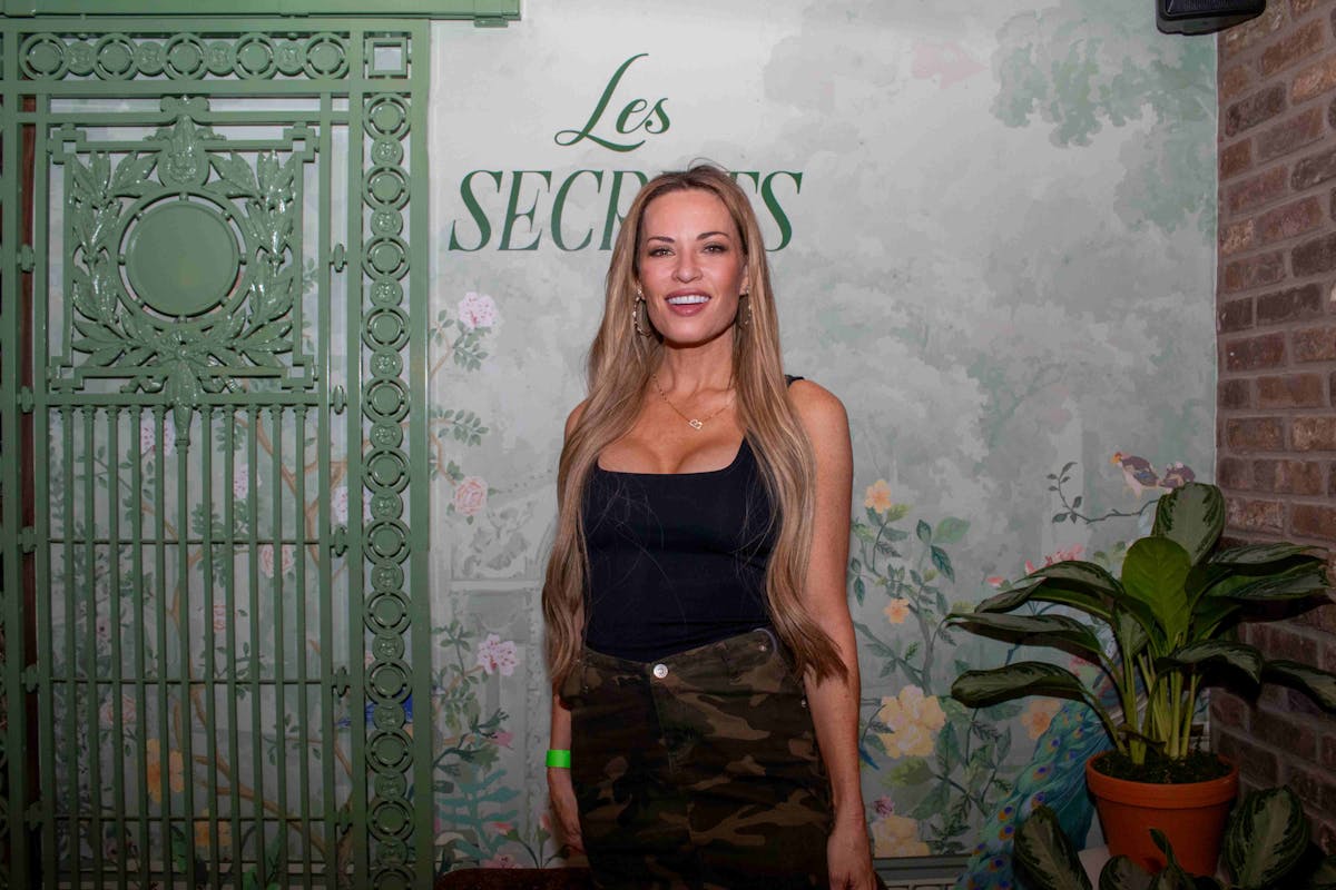 Britani Bateman standing in front of a door