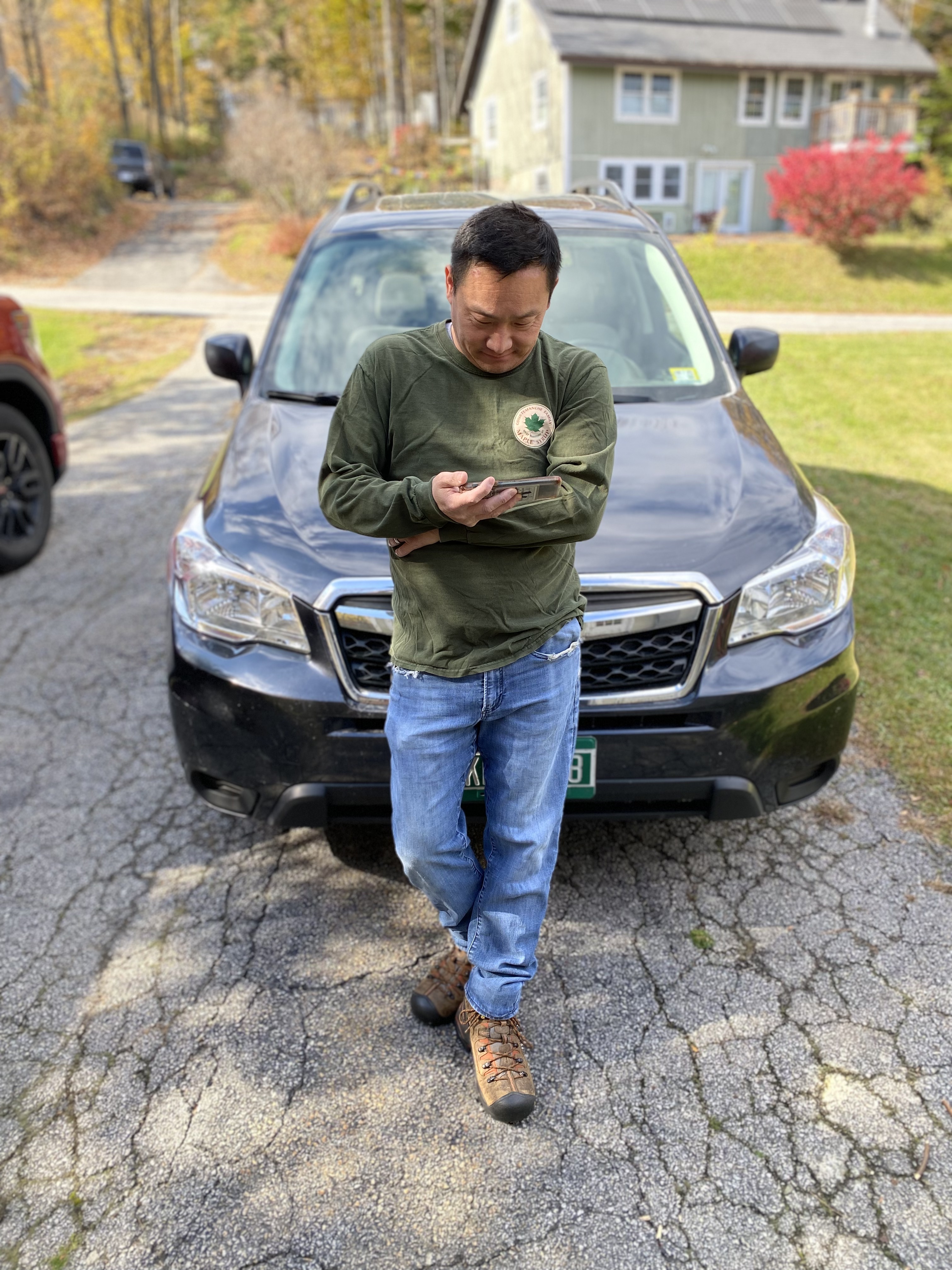 Man in front of a car.
